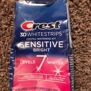 Two boxes of Crest sensitive whitening kit.